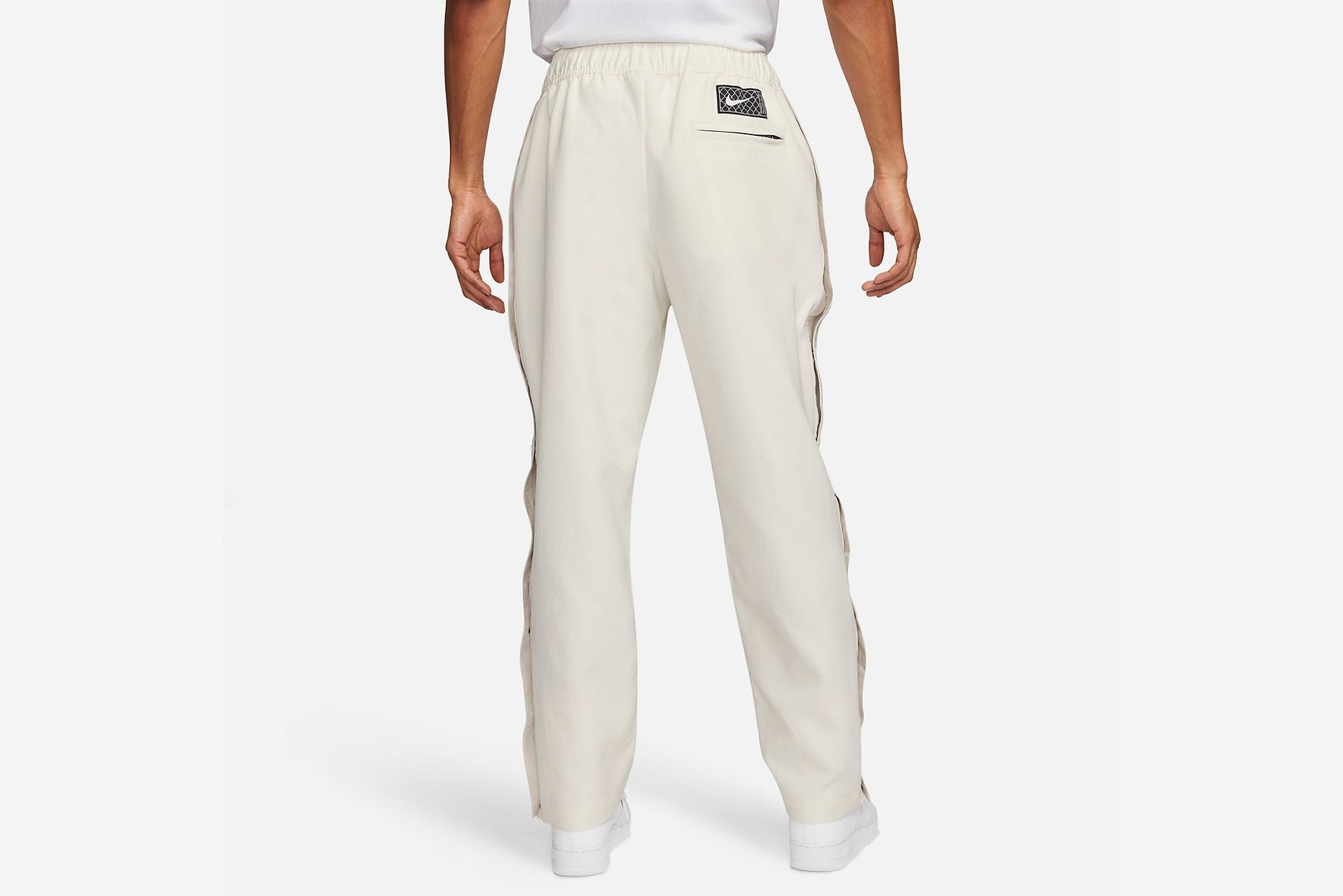 Order NIKE Solo Swoosh Woven Track Pant white/black Pants from solebox |  MBCY